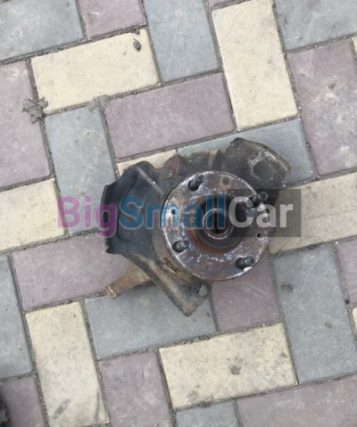 Поворотный кулак левый KIA Cerato 1 Поворотный кулак левый KIA Cerato 1