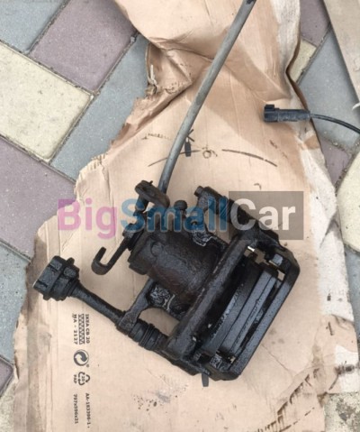 Задний левый суппорт Opel Astra j gtc 1.4 Задний левый суппорт Opel Astra j gtc 1.4